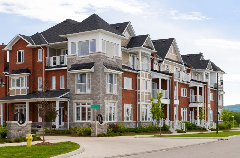 stock-photo-attractive-apartment-building-141976228