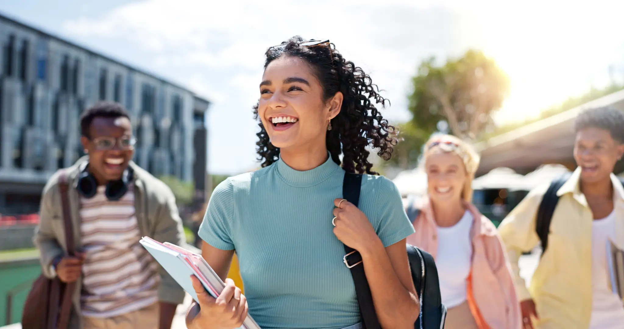 stock-photo-walking-happy-and-girl-with-friends-at-university-for-learning-bonding-and-talking-with-fun-2477767447