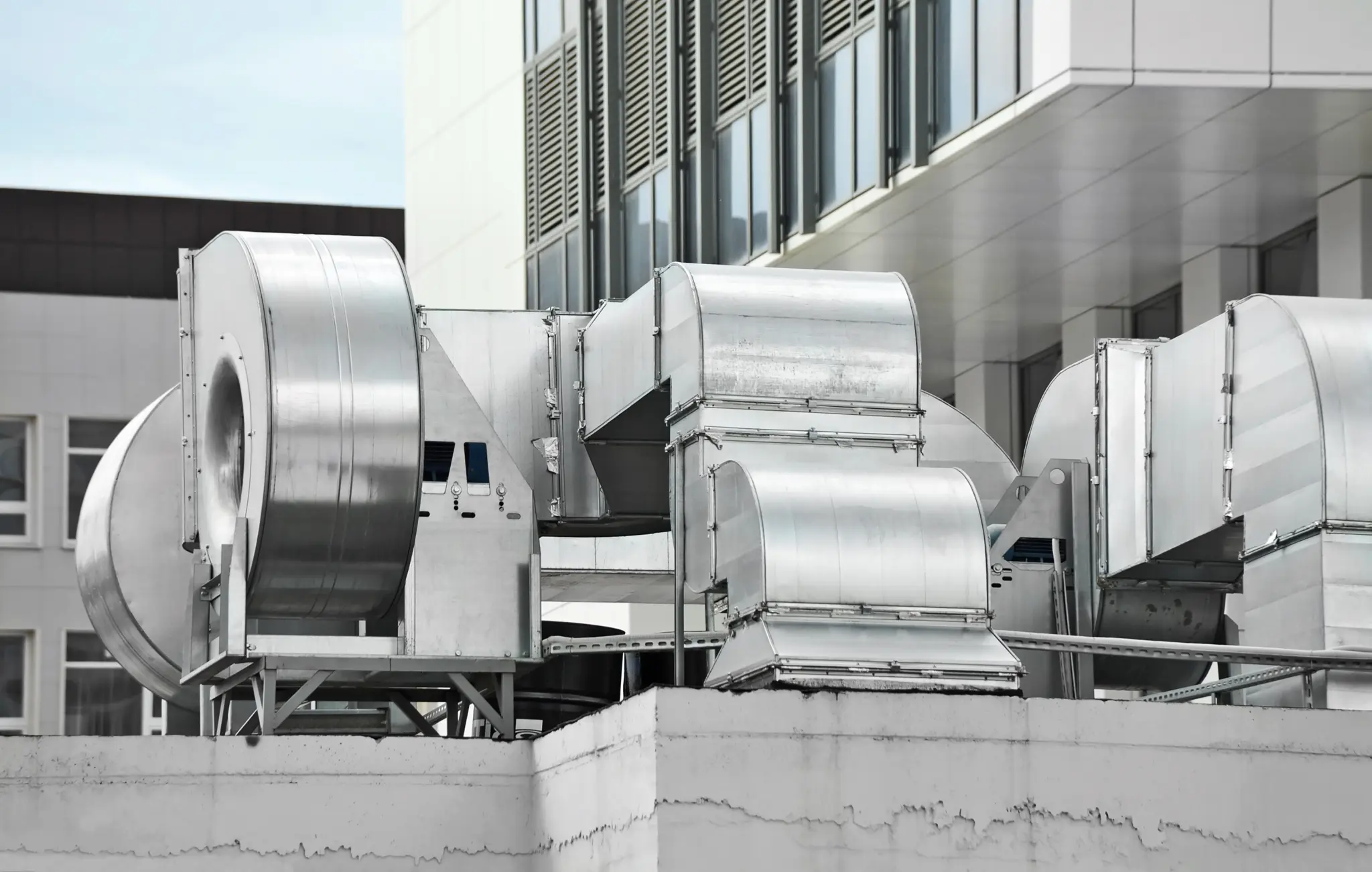 stock-photo-industrial-air-conditioning-and-ventilation-systems-on-a-roof-359029724