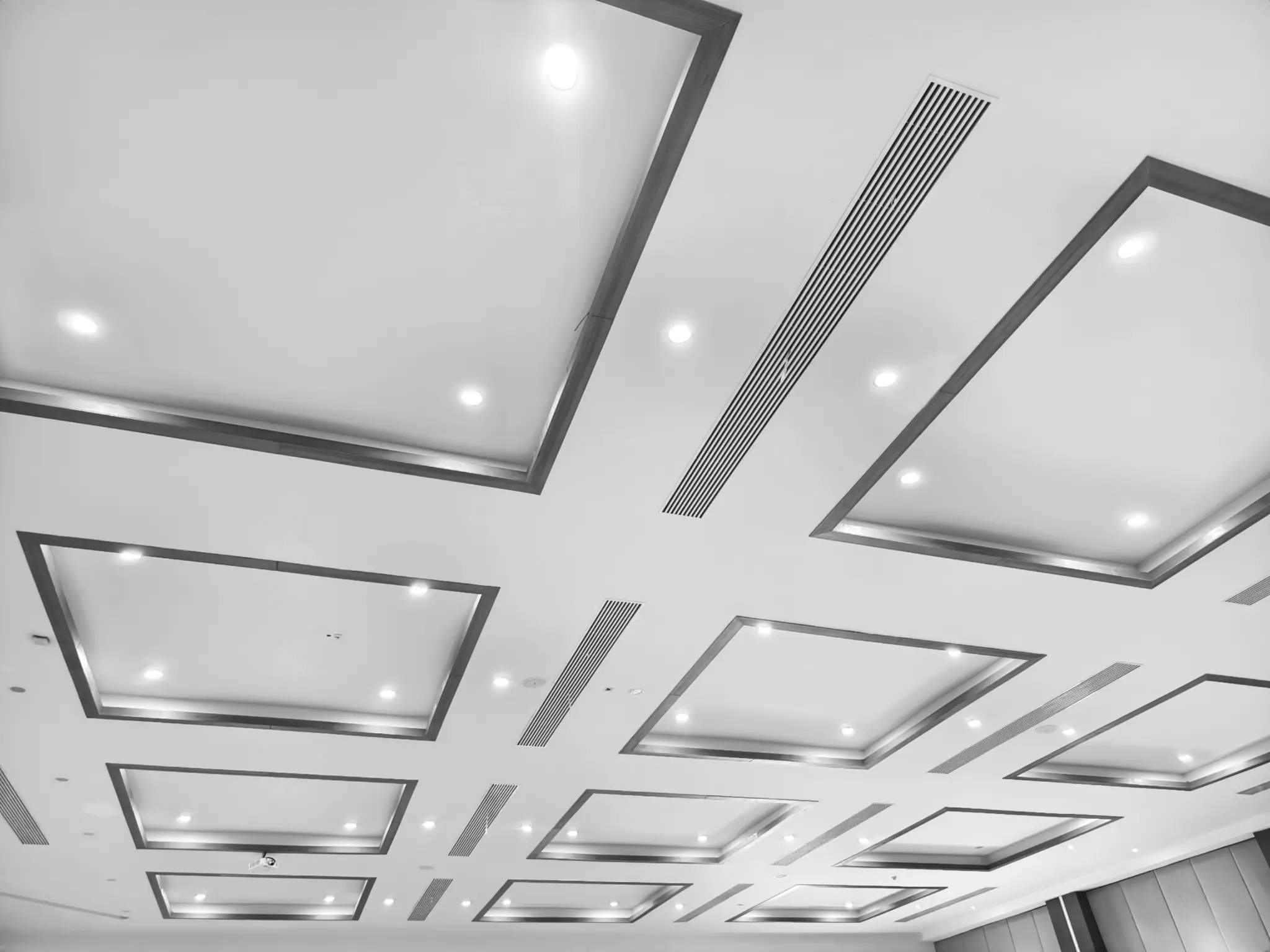 stock-photo-office-room-ceiling-with-lighting-ceiling-with-led-lamps-in-the-office-interior-decoration-concept-2448375591