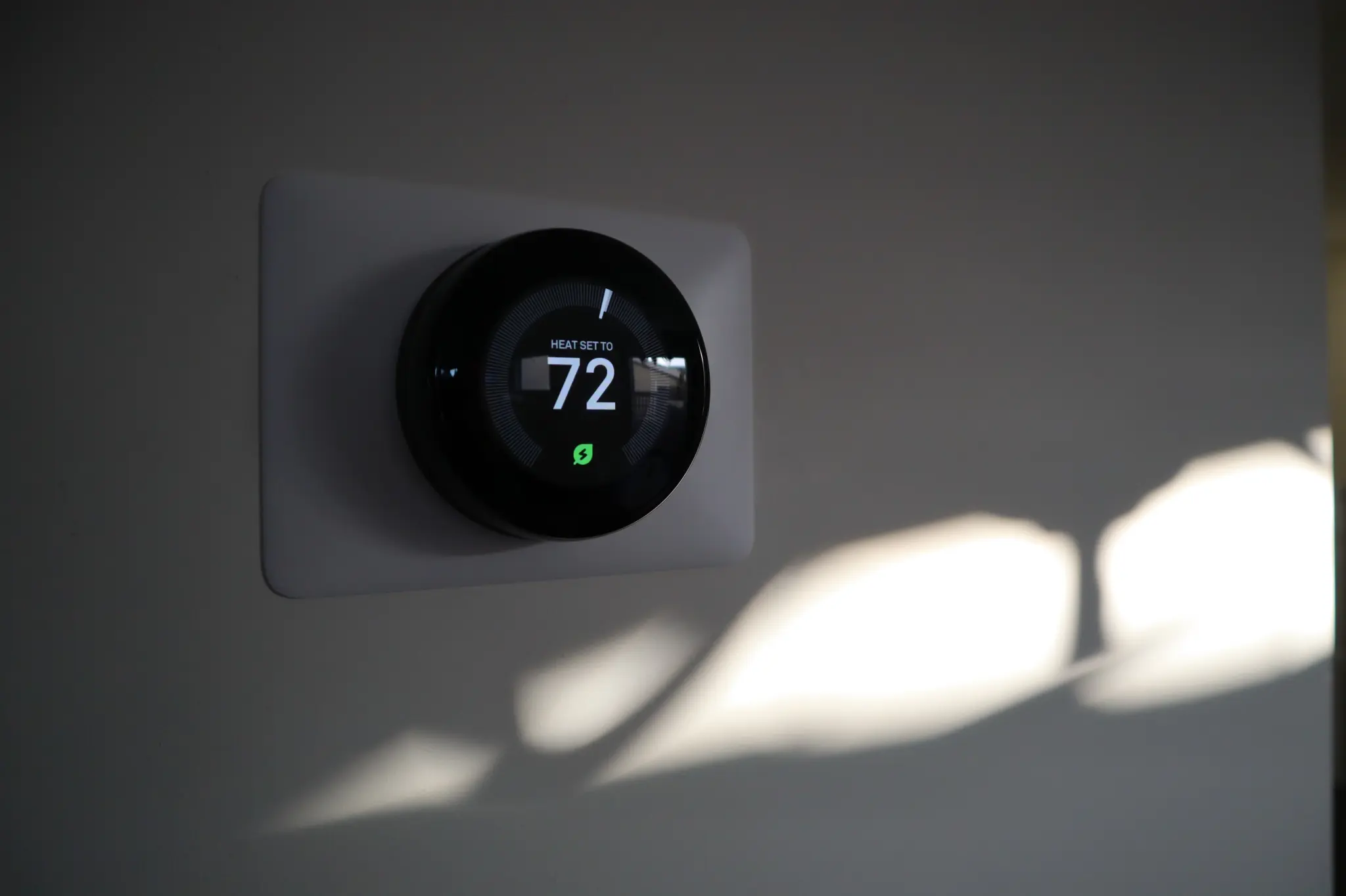 stock-photo-thermostat-in-a-house-at-sundown-2293679881
