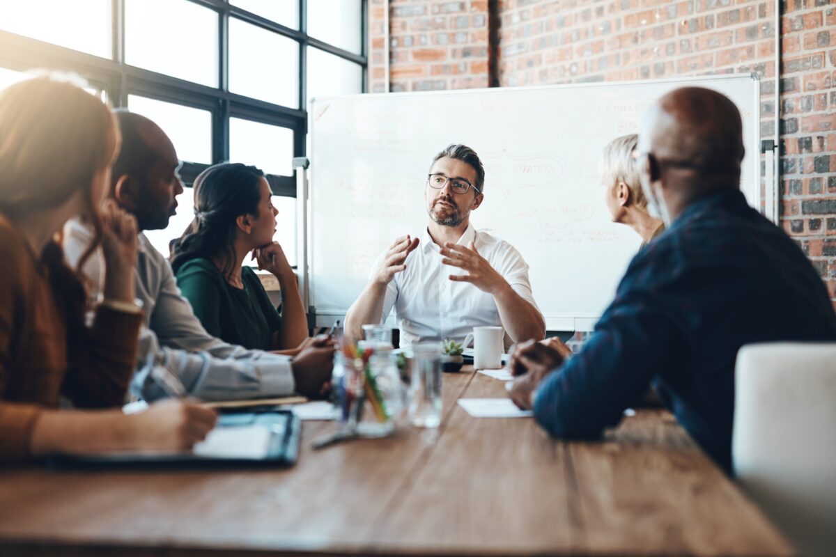 stock-photo-man-manager-and-meeting-or-presentation-in-boardroom-with-coworkers-for-corporate-business-seminar-2473319593