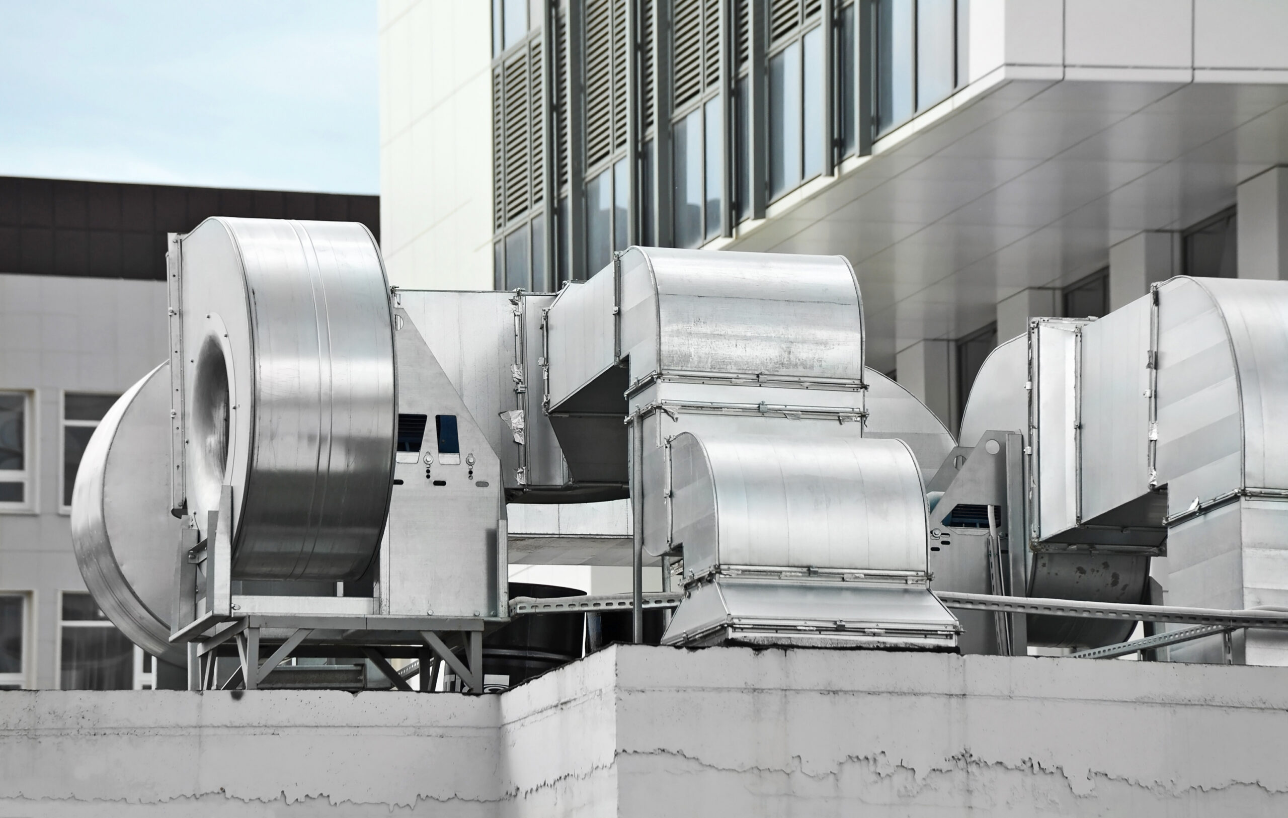 stock-photo-industrial-air-conditioning-and-ventilation-systems-on-a-roof-359029724